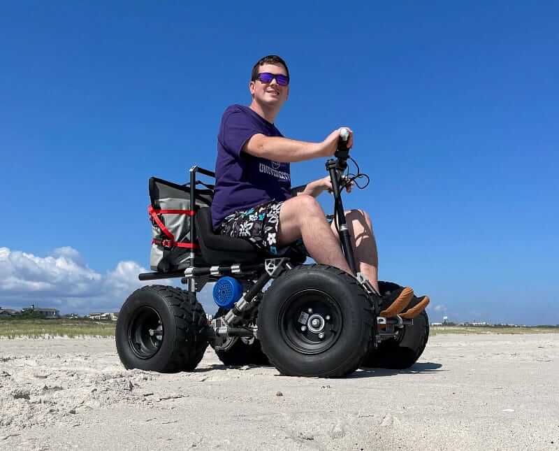 Dale Short riding his sand cart on the beach